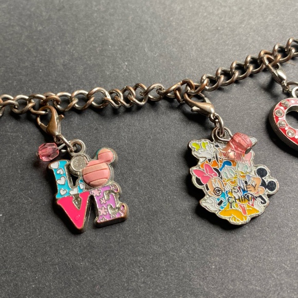 Disney charm bracelet with 7 charms plus the silver toned Mickey head - Picture 4 of 10